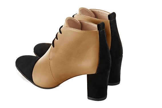 Matt black and camel beige women's ankle boots with laces at the front. Round toe. Medium block heels. Rear view - Florence KOOIJMAN